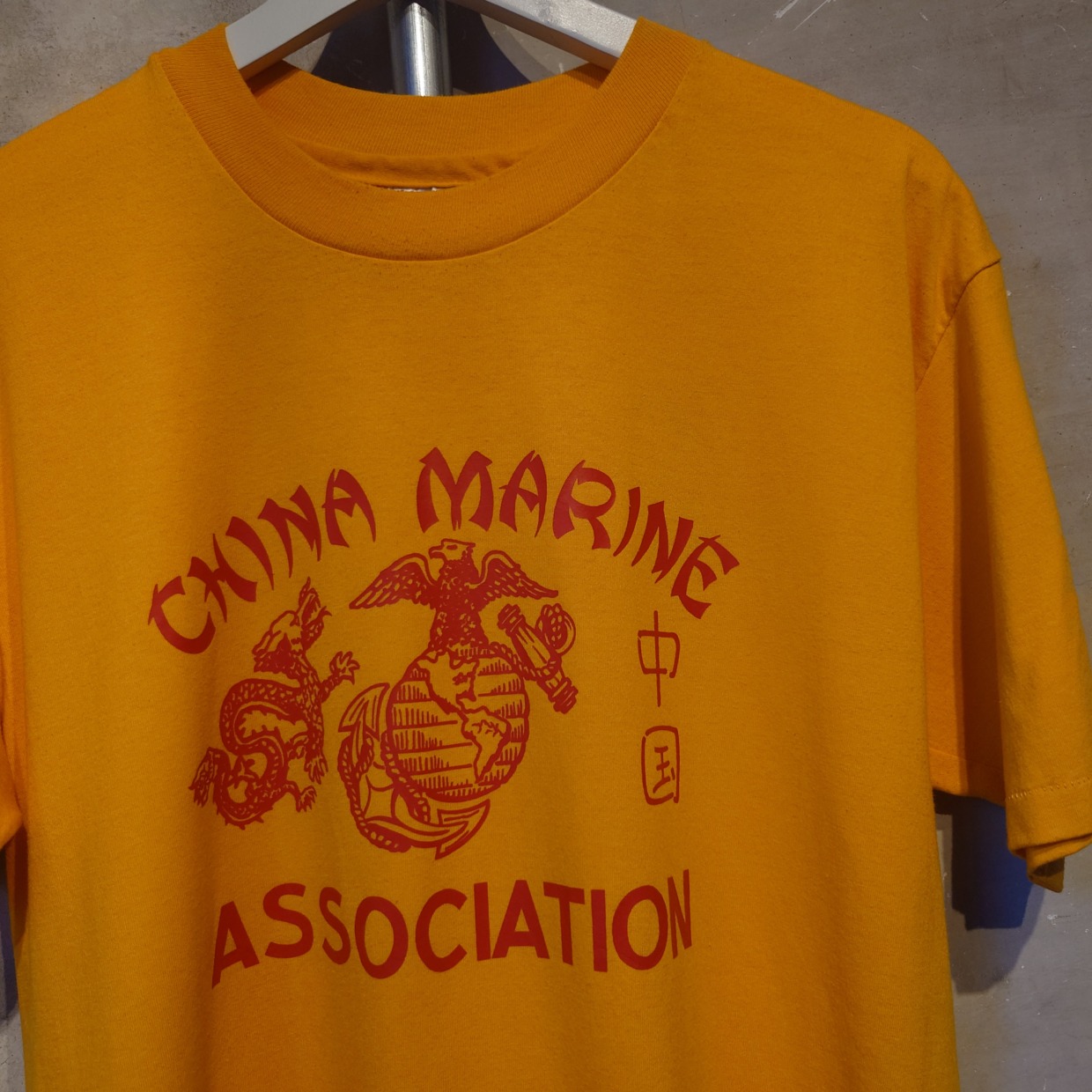 411　Hanes(ヘインズ)CHINA MARINEプリントTシャツ　オレンジ　Lサイズ